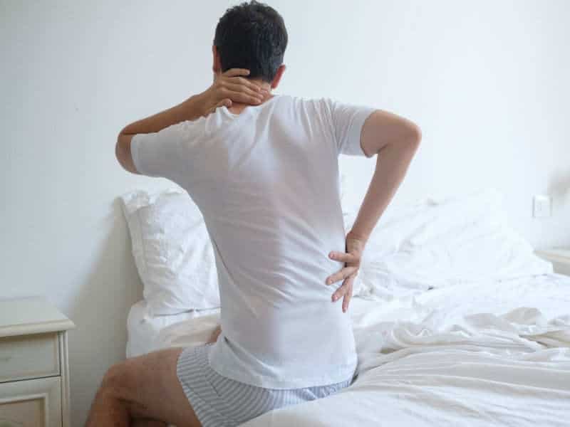 sleep on firm mattress to relieve back pain