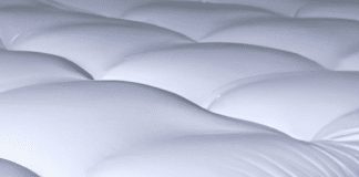 how do i keep a mattress protector from shifting